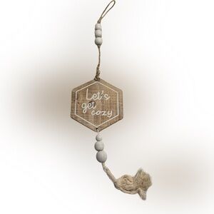 NWOT Hanging wooden beaded tassel sign “Let’s get cozy” approximately 20” (a)